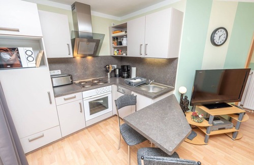 Stangerode Apartment | Cosy apartment for 4 people with WIFI, TV and patio