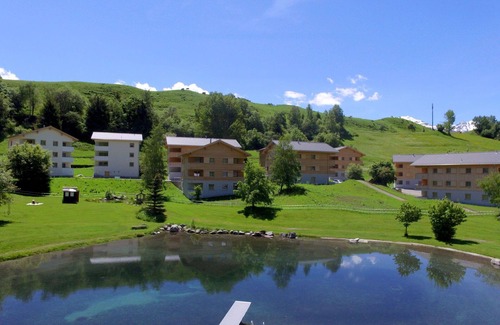 Tavanasa Apartment | Cosy apartment for 4 guests with pool, WIFI, hot tub, TV, patio, panoramic view and parking