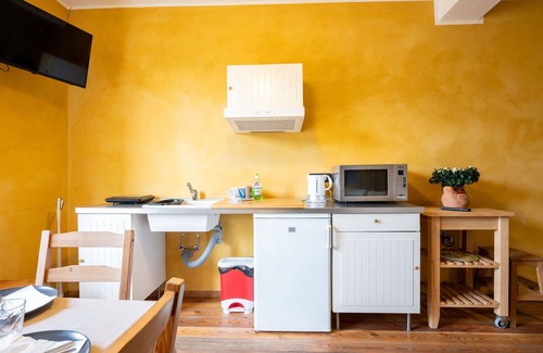 Cortemilia Apartment | Cosy apartment for 6 people with WIFI, pool, TV, terrace and pets allowed