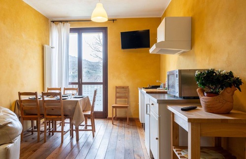 Cortemilia Apartment | Cosy apartment for 6 people with WIFI, pool, TV, terrace and pets allowed