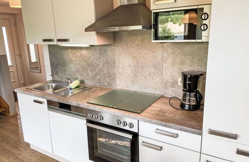 Hechthausen House | Cosy apartment in villa for 6 guests with WIFI, pool, TV, terrace and pets allowed