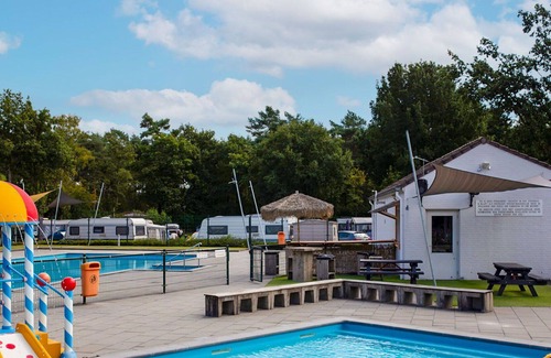 Soerendonk House | Cosy apartment in villa for 6 guests with pool, TV, terrace, pets allowed and parking