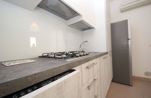 Rosolina Mare House | Cosy apartment in villa for 4 guests with WIFI, A/C, TV, terrace, pets allowed and parking