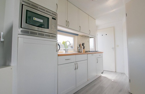 Municipality of Stichtse Vecht Boat Rental | Cosy chalet with jetty