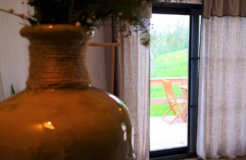 Mafra House | Cosy chic cabin with private terrace, shared heated* swimming pool