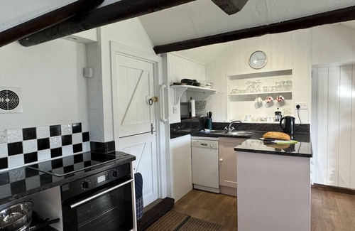 Bugford Apartment | Cosy cottage, rural location, beautiful landscaped gardens with pond and lake