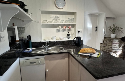 Bugford Apartment | Cosy cottage, rural location, beautiful landscaped gardens with pond and lake