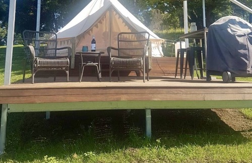Killabakh RV Rental | Cosy glamping tent with mountain views… and friendly moos