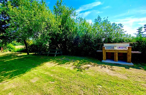 Valenciennes Apartment | Cosy Tipi on Stilts by Pond: Sleeps 4, Nature Retreat, Wood Stove, Fishing, Petanque, Near Lille