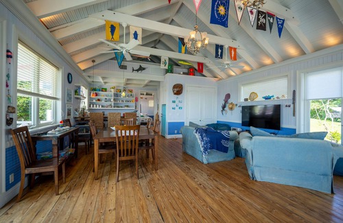 Green Turtle Cay Cottage | Cottage directly on White Sound. Dock steps away. Fish or swim off the dock.