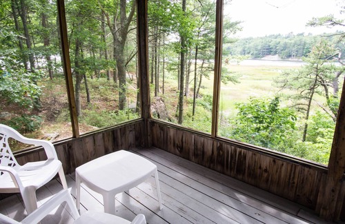 Arrowsic Cottage | Cottage featuring a Screened Porch overlooking the Water