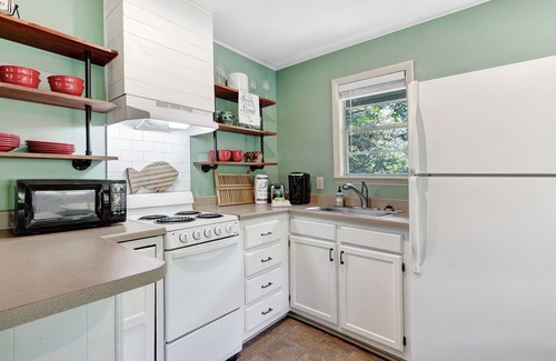 Sylva Cottage | Cottage on the Tuckasegee River with firepit, picnic area, hot tub, & AC