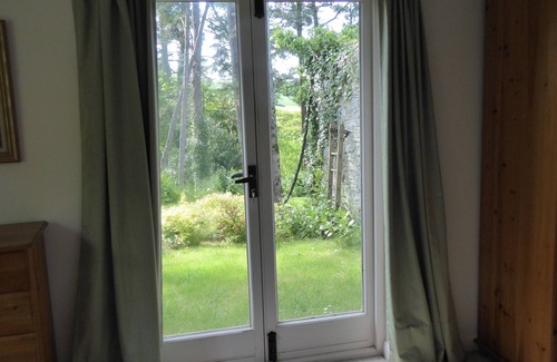 Goveton Cottage | Cottage Sleeps 2 in Bedroom + 2 on sofa bed in sitting room with privacy curtain