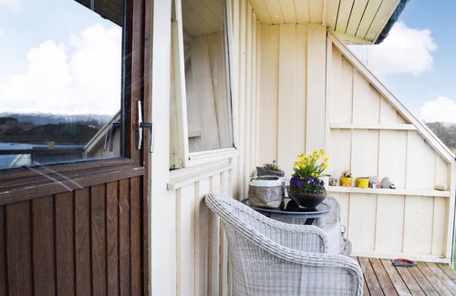 Sveio House | Cottage with beautiful terraces and great views of the Ålfjord.