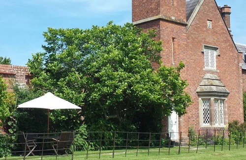 Whitchurch Cottage | Cotton Cottage has some unique features, including a Jacobean style turret.