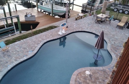 Fort Myers Shores House | Couples Retreat upstairs suite off the Caloosahtchee River with private pool