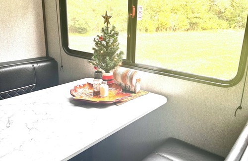 Greenville House | Cozy 1-bedroom RV on private stocked pond. Glamping in Greenville