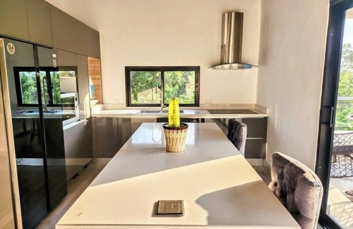Los Brazos Apartment | Cozy 2-bedroom apartment in lovely Sabaneta with WiFi, AC