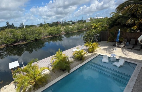 Big Pine Key House | Cozy 2-bedroom house in charming Big Pine Key with canal view and relaxing pool