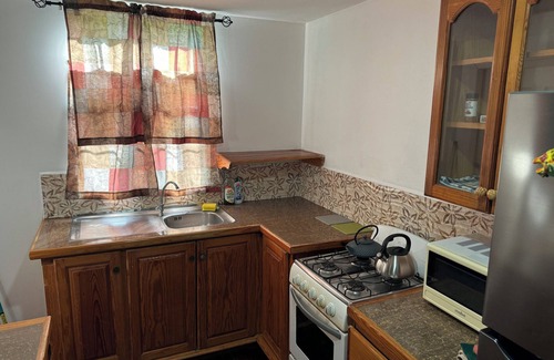 Crochu House | Cozy 2-bedroom house among the trees With WiFi and AC, Close to a Beach