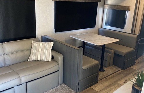 Florence RV Rental | Cozy 2-bedroom RV in a pleasant campground in brilliant Florence with AC, WiFi.