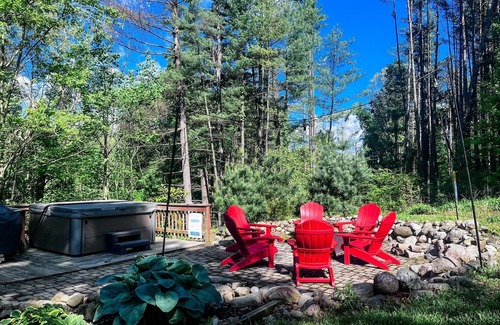 Butler Cabin | Cozy 2BR/2BA cabin tucked in the trees with hot tub, fire pit, covered deck, and fast WiFi.