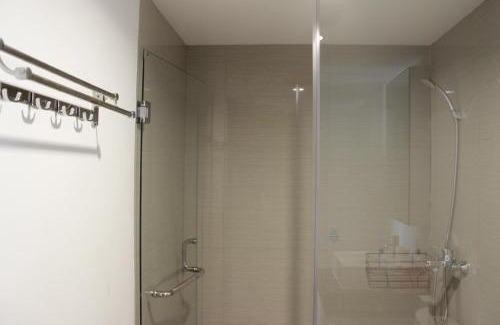 Braga Apartment | Cozy 2BR Apartment at Tamansari Tera Residence near BIP By Travelio