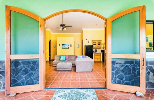 Junquillal House | Cozy 3-bedroom retreat in Tierra Pacifica with lush gardens, AC, hammock rancho, and full access to pool, gym, yoga room, and more.