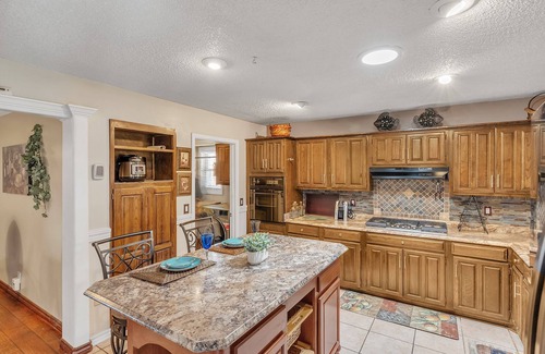 Tulsa House | Cozy 4 Bedroom Home - Minutes to Downtown Tulsa by RedAwning
