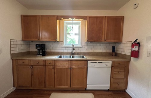 Norman House | Cozy and charming 2-bedroom house in Norman with EV charger. Close to downtown.