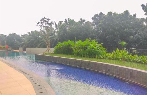 Depok Apartment | Cozy and Homey Studio Room Transpark Cibubur Apartment By Travelio