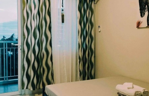 Tagaytay Apartment | Cozy apartment in enjoyable Tagaytay with WiFi, AC, Pool Access-7th floor SMDC