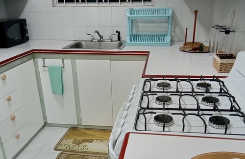 Christie Apartment | Cozy apartment w/air conditioning. Near beaches, malls and luxurious shopping.