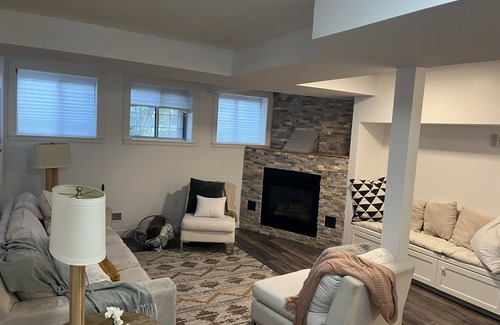 Cedarbrae House | Cozy basement suite w/fireplace. Pet friendly!