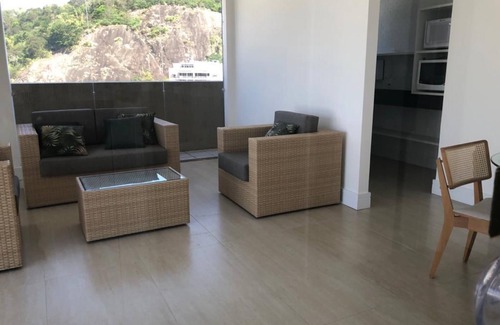 Leblon Apartment | Cozy bedroom and living room with balcony in Leblon.