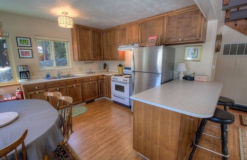 Country Club Estates House | Cozy Cabin 4 Bedroom Home by RedAwning