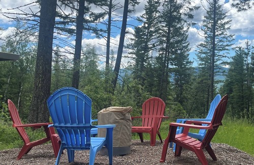 Bigfork Cabin | Cozy cabin bordering forest service trails. Perfect escape on 10 acres of forest
