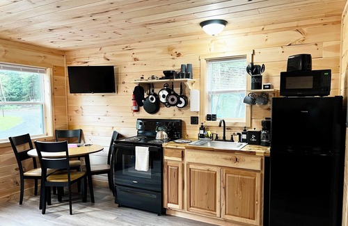 Sangerville Cabin | Cozy cabin located on the Atv & snowmobile trail. Family & Pet Friendly