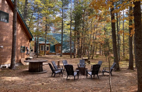 Paradise Cabin | Cozy Cabin nestled in the woods on all season road seconds from the trail system