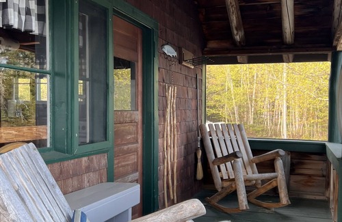 Rangeley Plantation Cabin | Cozy cabin on the water with fantastic views of Mooselookmeguntic Lake.