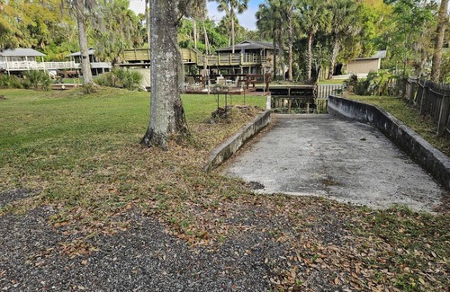 Astor House | Cozy canal front house with its own boat ramp and dock. Amazing waterfront view.