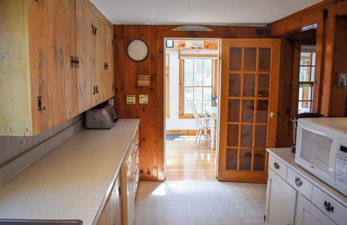 Dennis Port House | Cozy cape cod cottage with lovely wood floors and central AC.