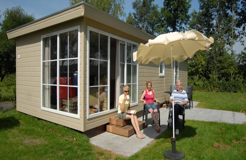 Hoge Hexel Ski Chalet | Cozy chalet with air conditioning and steam shower, at a holiday park in Twente
