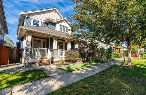 East Clayton House | Cozy, clean basement suite in beautiful Clayton Heights with gas fireplace!