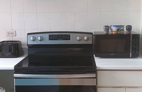 Florencio Condo | Cozy condo in gated community near beaches, shopping, and attractions