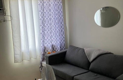 Dumaguete Apartment | Cozy condo with AC and fitness room in lovely Dumaguete steps from the Ocean