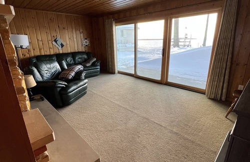 Houghton Lake House | Cozy Cottage, fresh laid sod, new concrete patio and sidewalk, sandy beach!