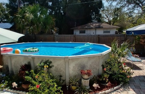 Largo House | Cozy Cottage w/Sunporch & Pool, 8 miles to Indian Rocks Beach.