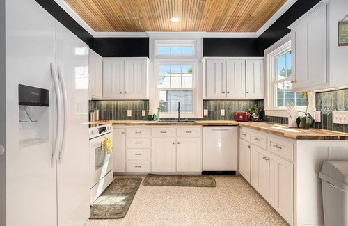 Morgan Ski Chalet | Cozy cottage with rooftop deck, fire pit, hot tub & community boat dock and cove