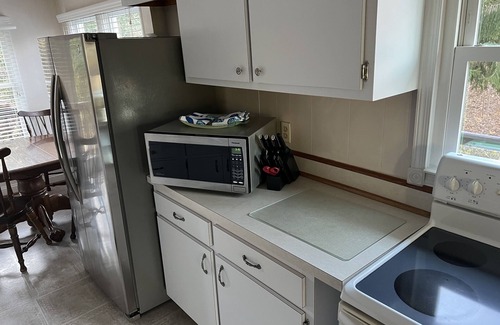 Port Republic Cottage | Cozy Cottage with access to and partially obstructed views of the bay.